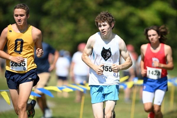 Quinn Lambert, a runner from South Burlington High School approaching the finish.
